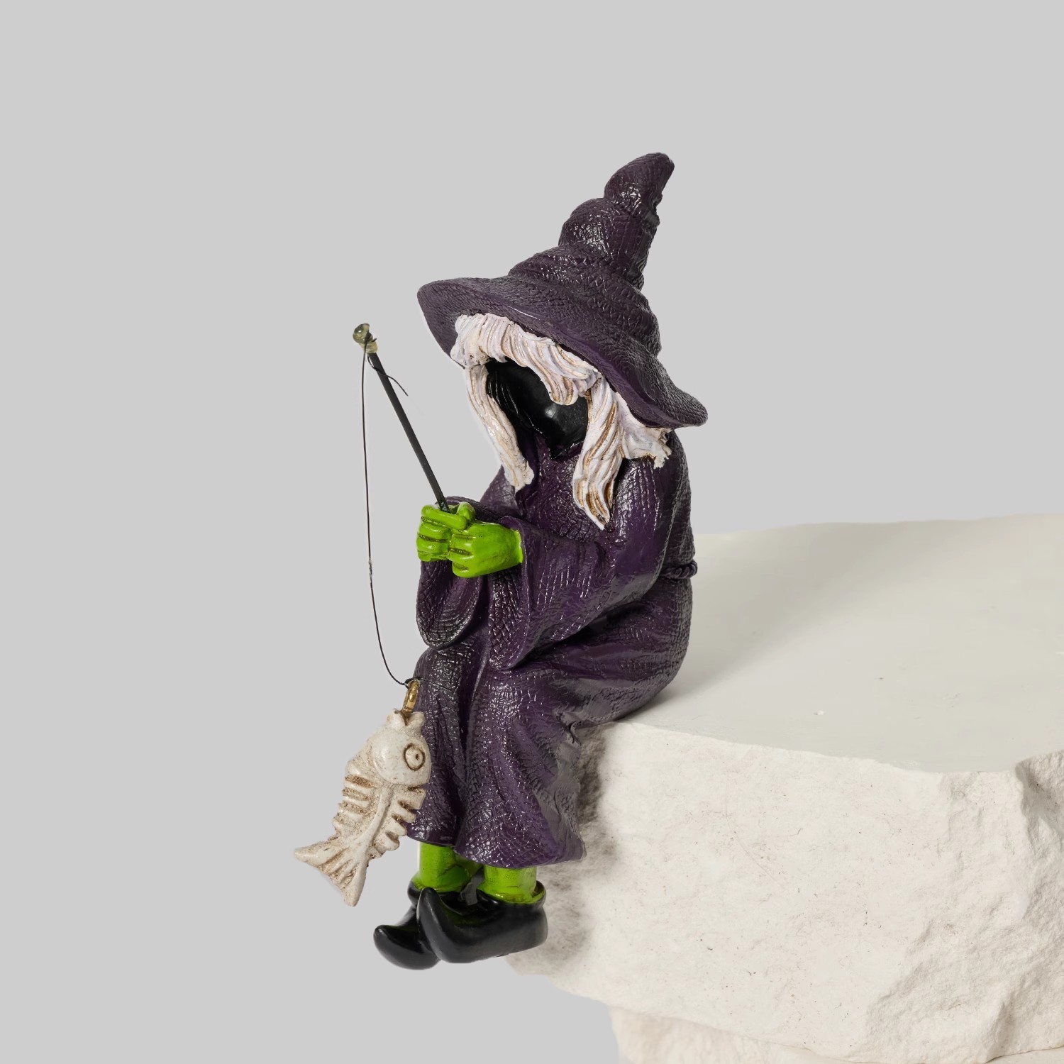 Bored Witch Fishing Figurine – Gothic Witchy Shelf Sitter with Skeleton Fish