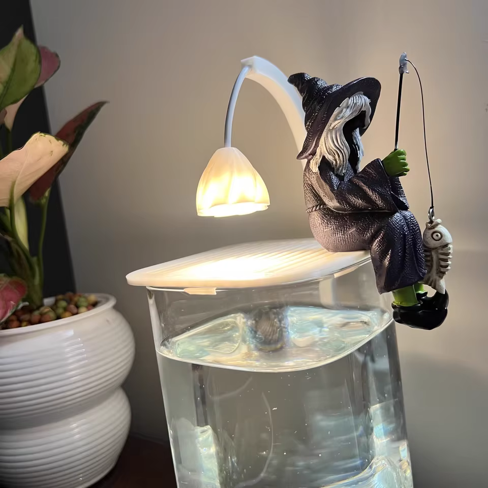 Bored Witch Fishing Figurine – Gothic Witchy Shelf Sitter with Skeleton Fish