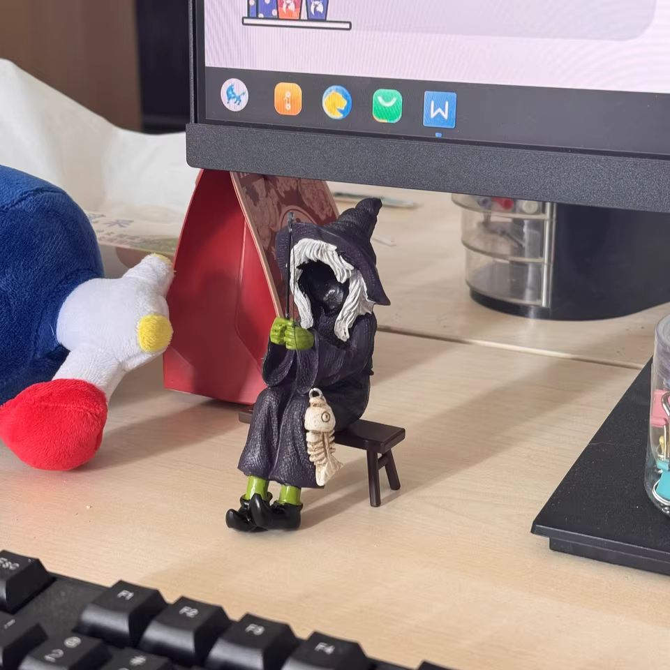 Bored Witch Fishing Figurine – Gothic Witchy Shelf Sitter with Skeleton Fish