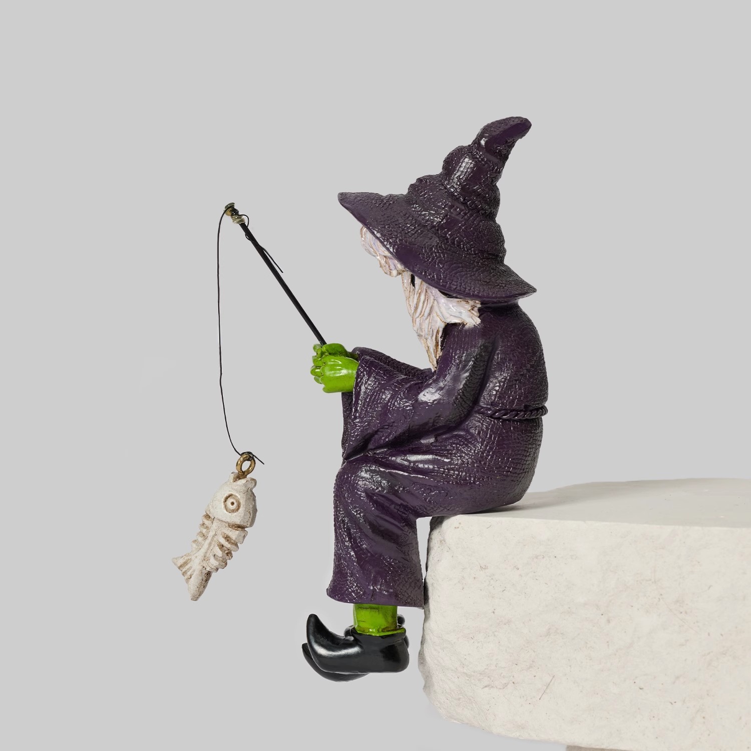 Bored Witch Fishing Figurine – Gothic Witchy Shelf Sitter with Skeleton Fish