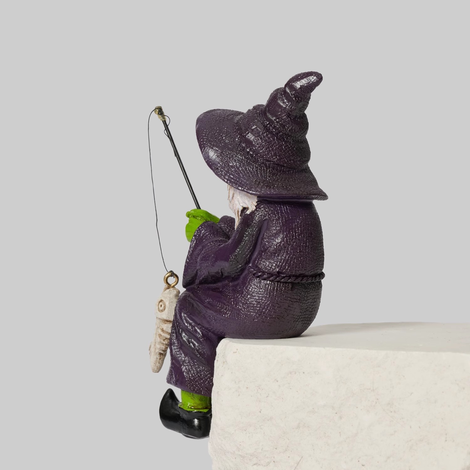 Bored Witch Fishing Figurine – Gothic Witchy Shelf Sitter with Skeleton Fish