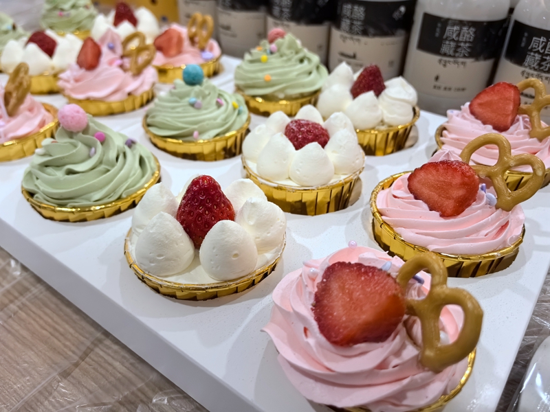 Delicate desserts, cakes, fruits, and other gifts