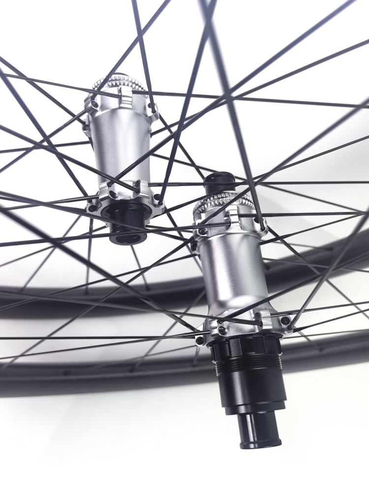 XMCS 26mm IW 50mm depth T1100 carbon 700C road/gravel bike wheelsets with 24/24H in-house hubs and Sapim CX-Ray spokes