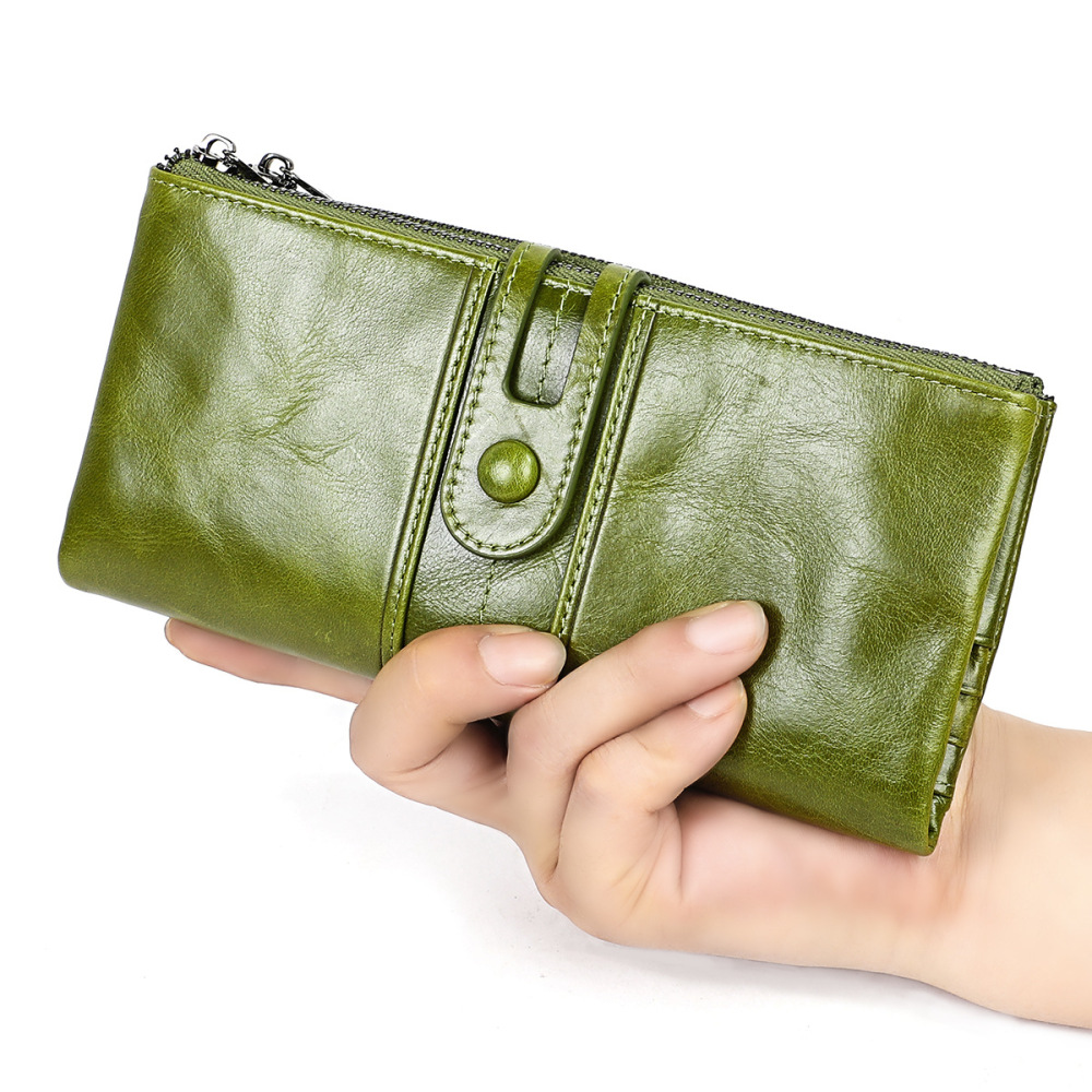 Wholesale Women's Genuine Leather Wallet First Layer Cowhide Tri-fold Wallet Multifunctional Long Coin Purse Supplier