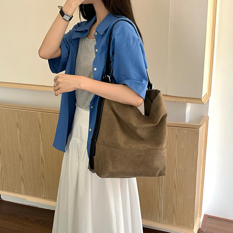 慵懒风通勤帆布大包女2025新款复古水洗布大容量单肩托特包斜挎包