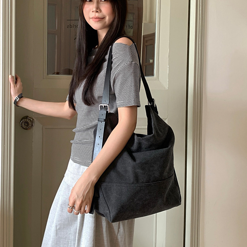 慵懒风通勤帆布大包女2025新款复古水洗布大容量单肩托特包斜挎包