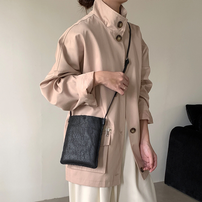 翻面两用毛绒水桶包2025新款毛毛包轻便百搭手机包女真皮斜挎包包
