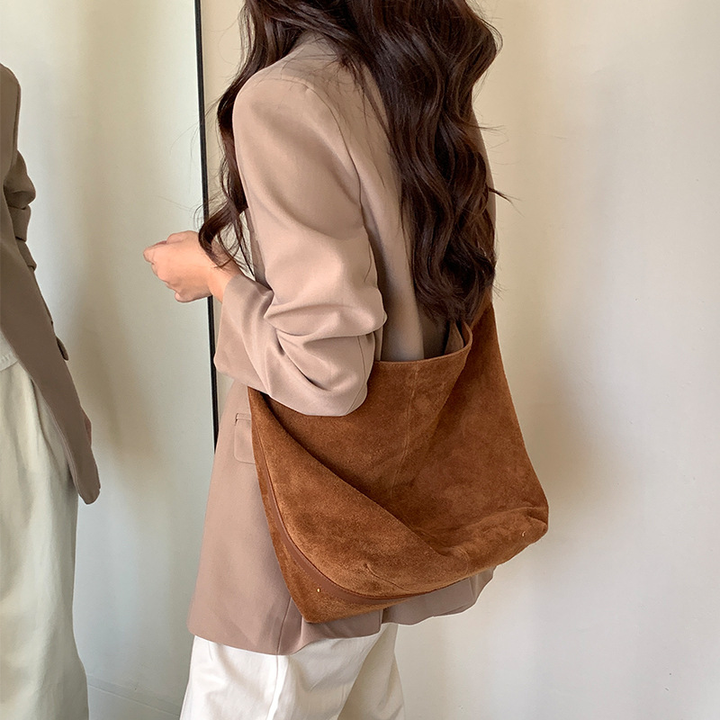 反绒磨砂牛皮女包2025新款松弛感真皮休闲麂皮单肩包托特水桶包女