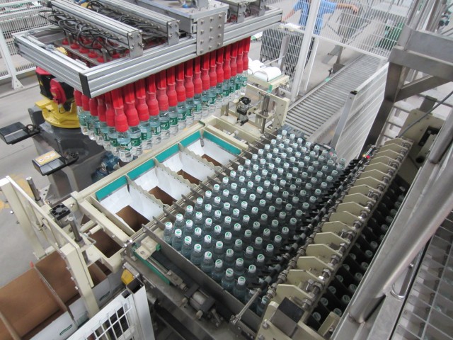 Pick and place packer