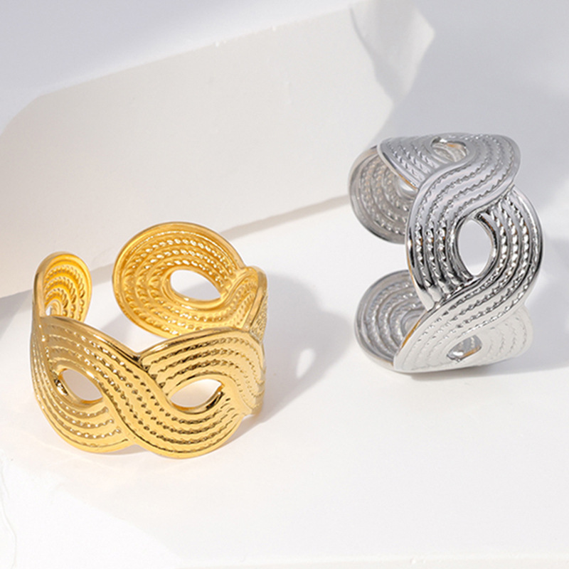 Fashion Wide Band Hollow Twisted Stainless Steel Opening Resizable ring / Bague réglable en acier inoxydable