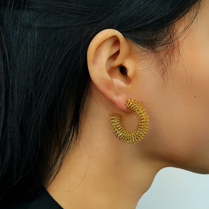 Gold Plated Irregular Stainless Steel Spring Hollow Earrings