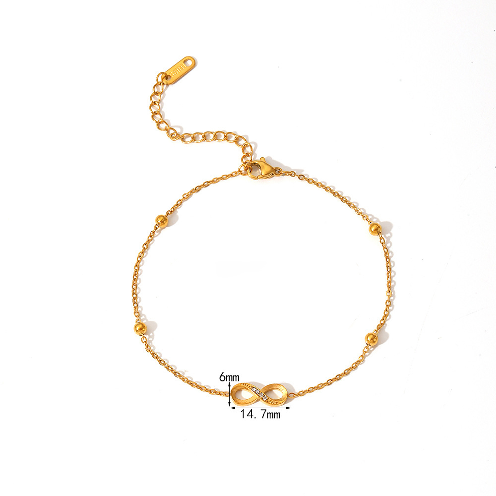 PVD Electroplated 18K Gold Stainless Steel Station Bracelet with Bow Collection