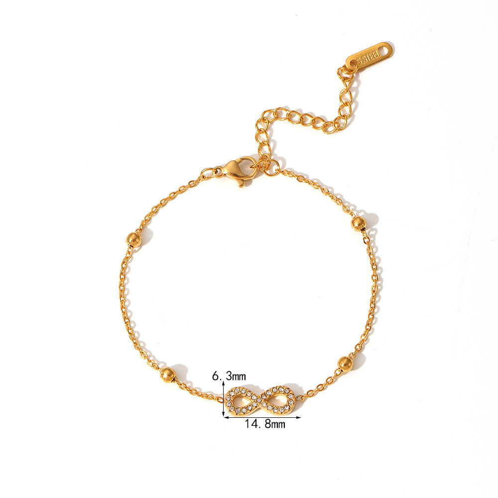 PVD Electroplated 18K Gold Stainless Steel Station Bracelet with Bow Collection