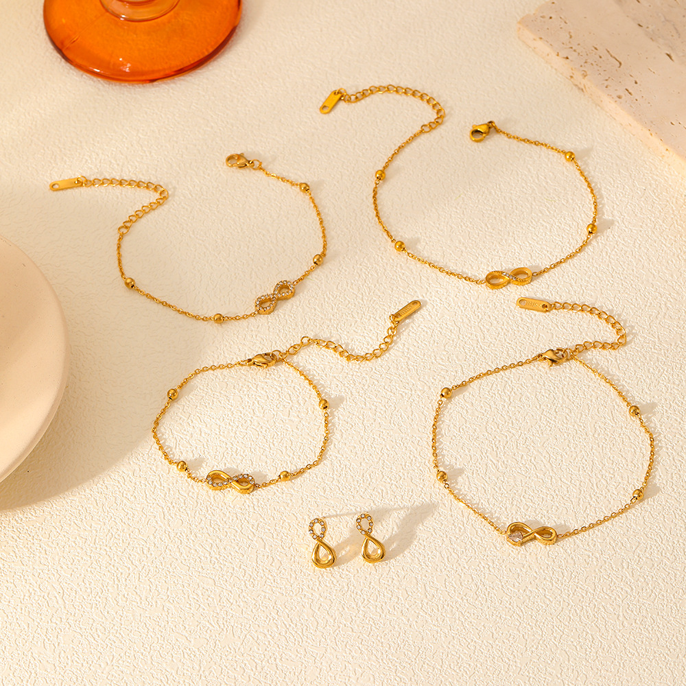 PVD Electroplated 18K Gold Stainless Steel Station Bracelet with Bow Collection