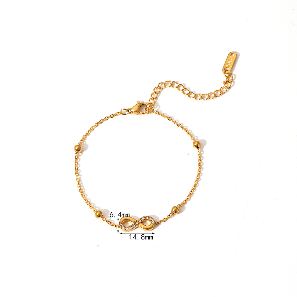 PVD Electroplated 18K Gold Stainless Steel Station Bracelet with Bow Collection