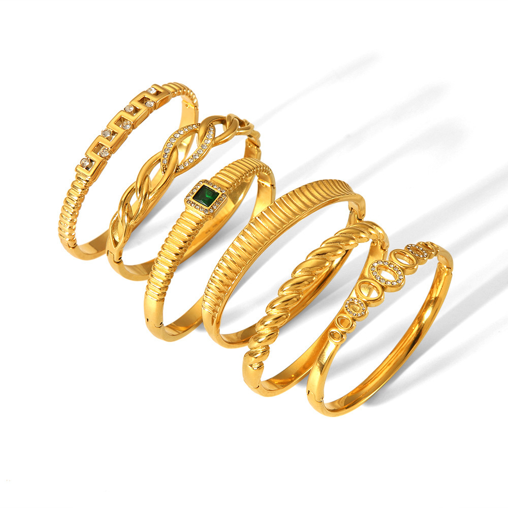 Bold Stainless Steel 18K Gold Plated Bangle with Rhinestones