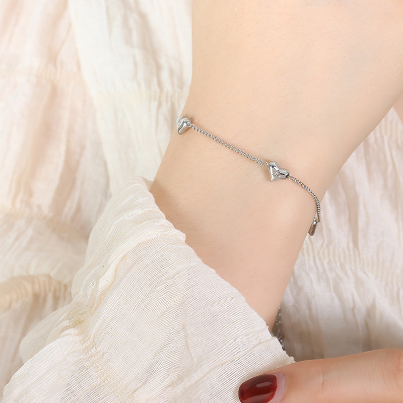 High-Polished Stainless Steel Peach Heart Bracelet with Zirconia