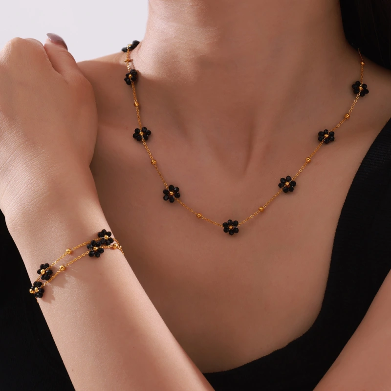 PVD 18K Gold Plated Stainless Steel Daisy with Black Natural Stone Station Bracelet