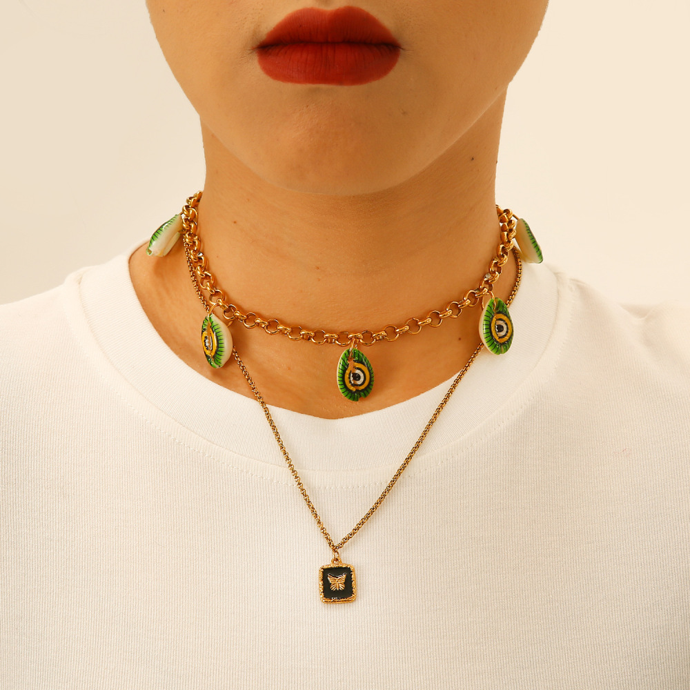 Ethnic wave pendant ruby mixed with seed beads necklace