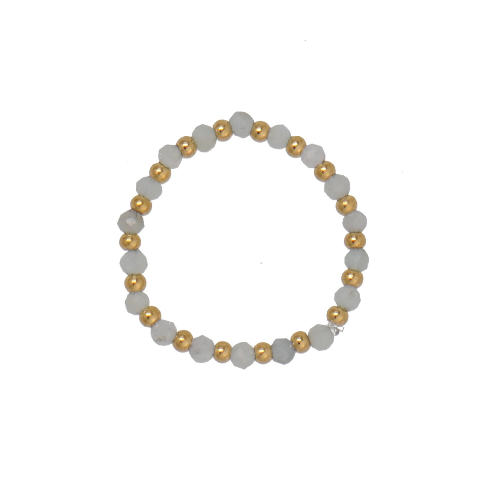 Bague extensible en perles de quartz clair alternant avec des perles en acier inoxydable plaqué or