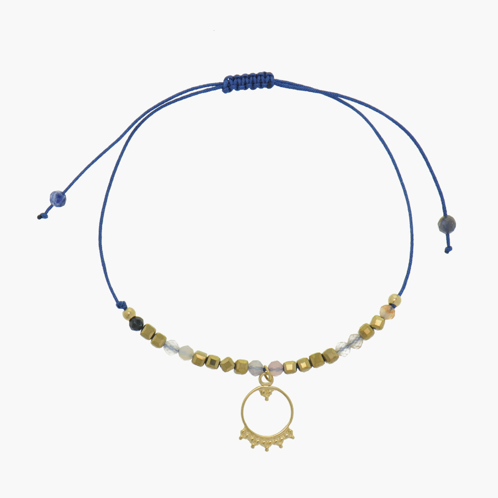 Adjustable bracelet with natural crystal and 14k PVD square beads, paired with stainless steel pendant