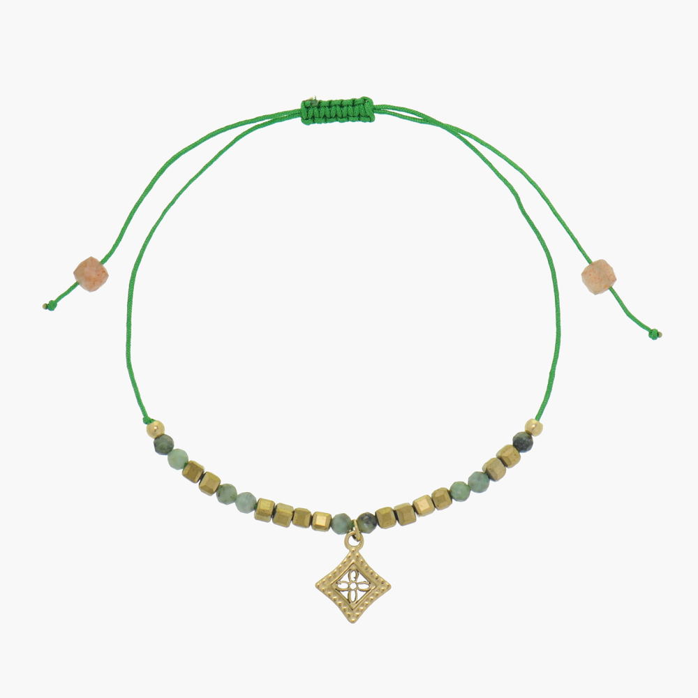 Adjustable bracelet with natural crystal and 14k PVD square beads, paired with stainless steel pendant