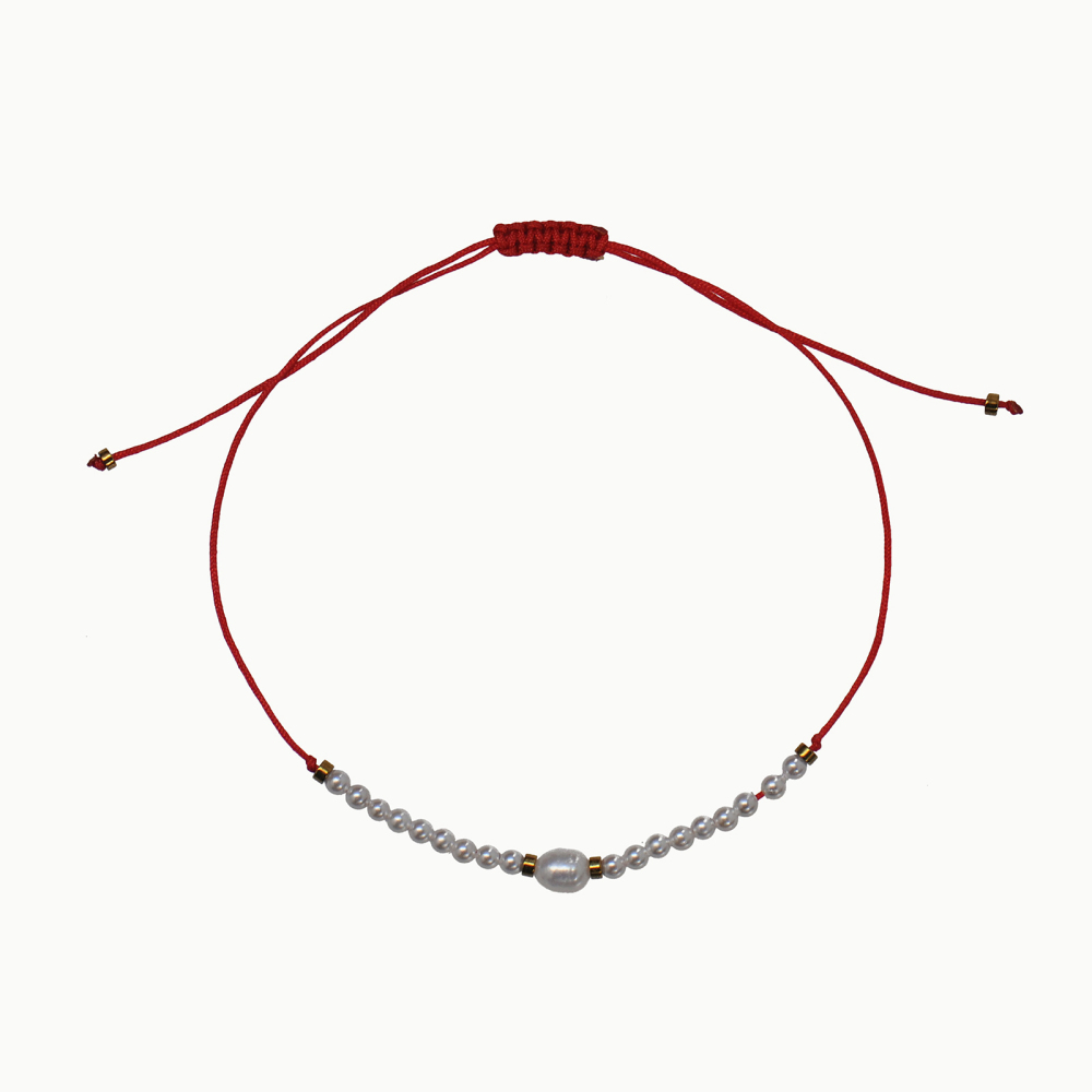 adjustable cord bracelet with natural pearls and small gold beads