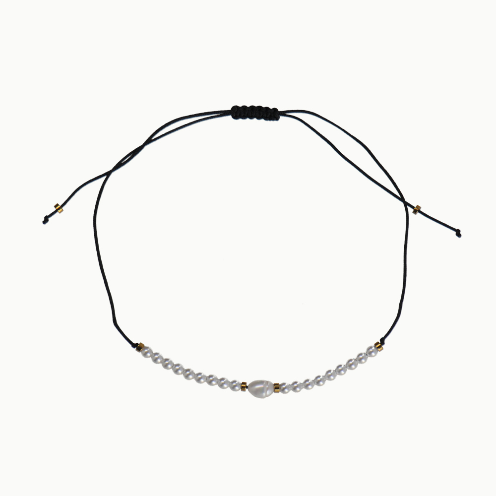 adjustable cord bracelet with natural pearls and small gold beads