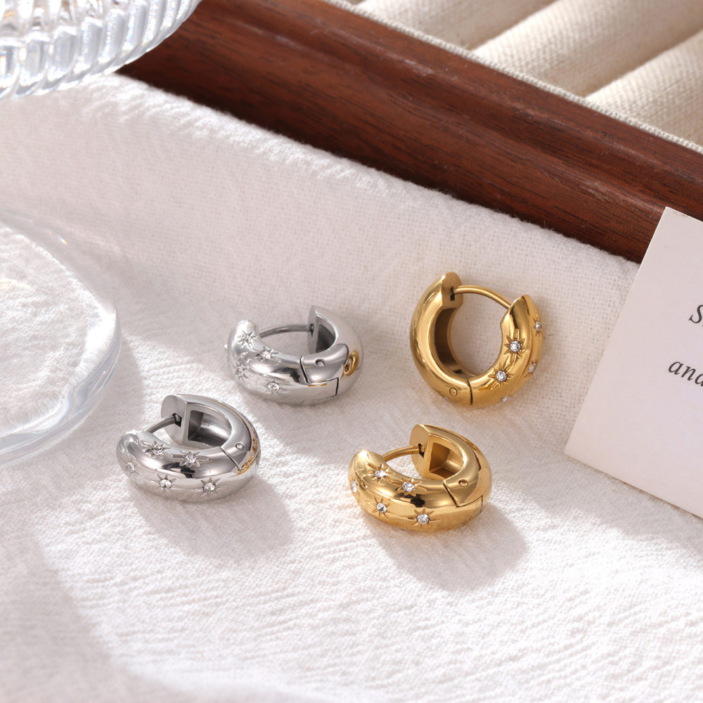 Bold Cubic Zirconia Star Hoop Earrings In stainless steel with 14K PVD-coating