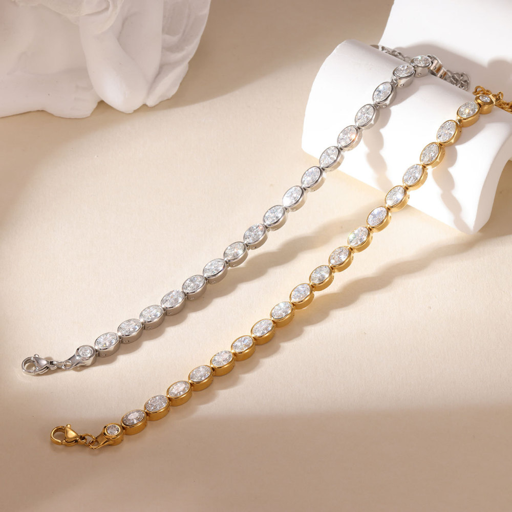 Bezel Set Oval CZ Tennis Bracelet in PVD Stainless Steel 14K Gold