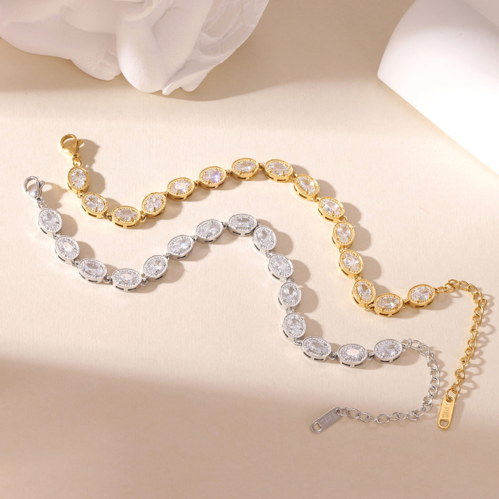Milgrain Edge Oval CZ Tennis Bracelet in PVD Stainless Steel with 14K Gold