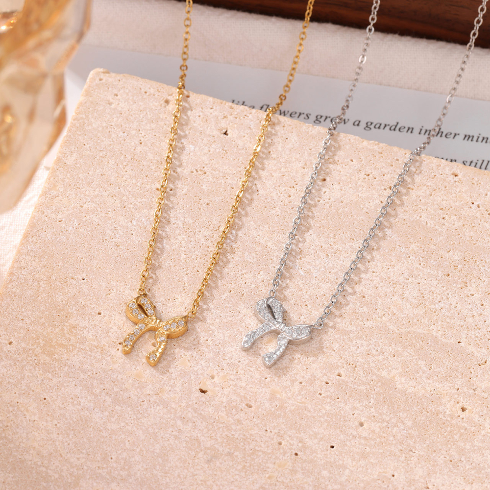 Full Pave CZ Bow Pendant Necklace in PVD Stainless Steel 14K Gold