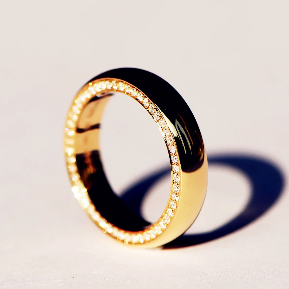 Ring with Sided Full Circle Stones