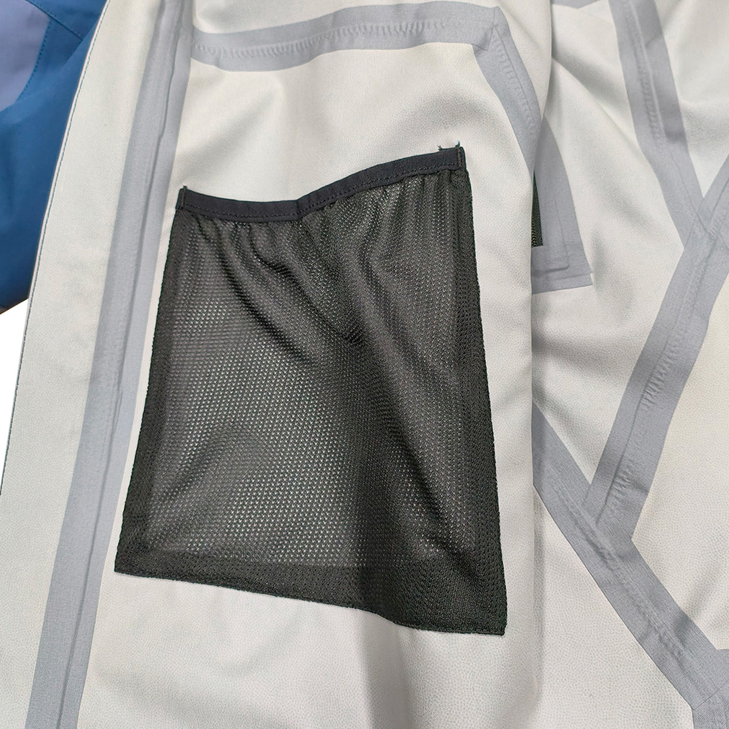 Veste de pluie bleu pâle respirante sous les bras en gros ODM&OEM par Yuelei