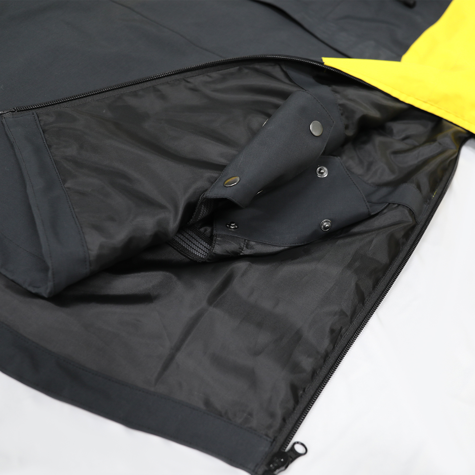 Veste de ski noire et jaune en gros de Yuelei : un design audacieux pour le ski