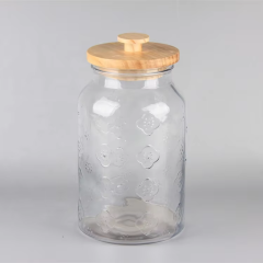 Top Selling Different Size Flower Pattern Clear Round Glass Food Storage jars with Wood Cover