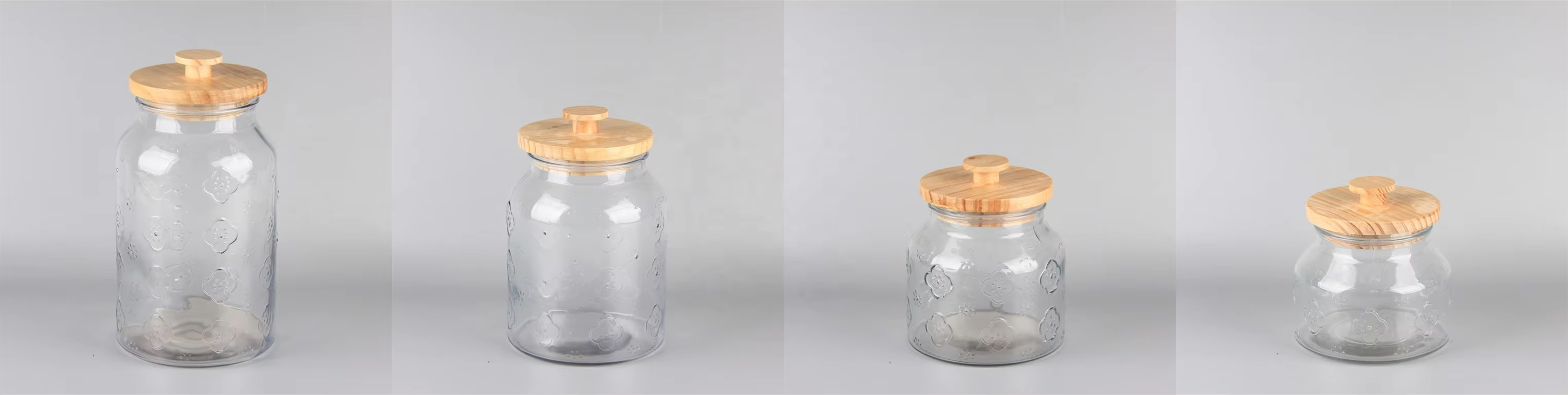 Top Selling Different Size Flower Pattern Clear Round Glass Food Storage jars with Wood Cover