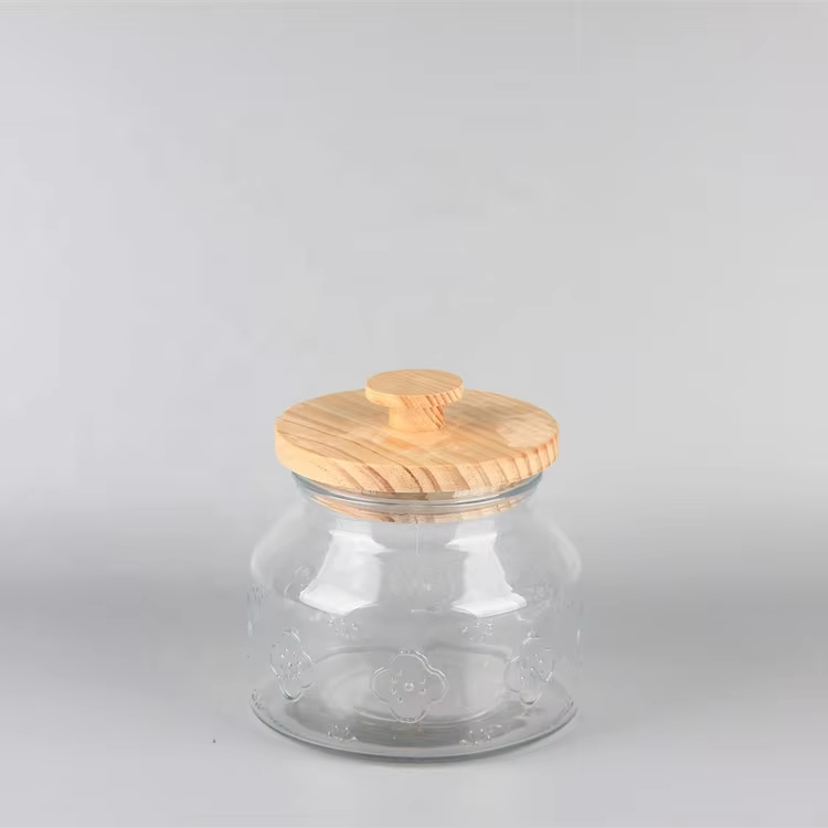 Top Selling Different Size Flower Pattern Clear Round Glass Food Storage jars with Wood Cover