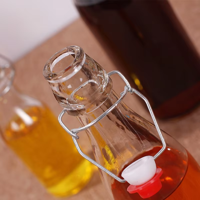 Factory Direct Kitchen Use Swing Clip Top Clear Sealed Glass Storage Beverage Bottles