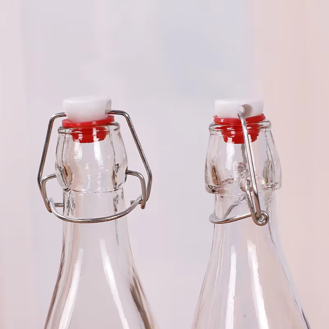 Wholesale Airtight Clip Top Drinking Bulk Transparent Glass Bottles for Juice Milk