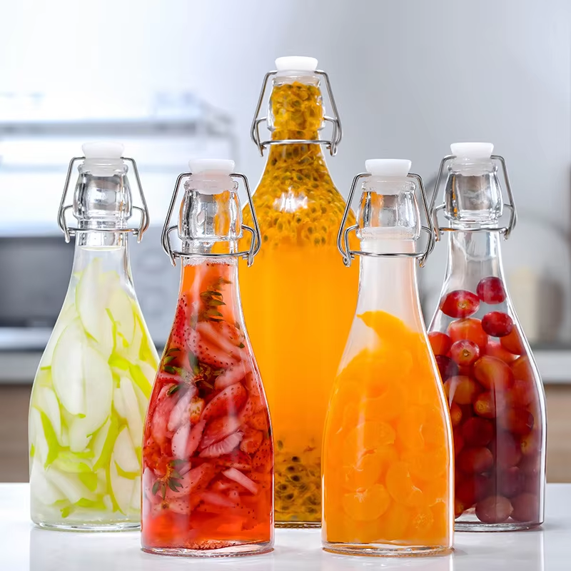Customized Transparent Sealed Glass Beverage Storage Bottles with Buckle Swing Top