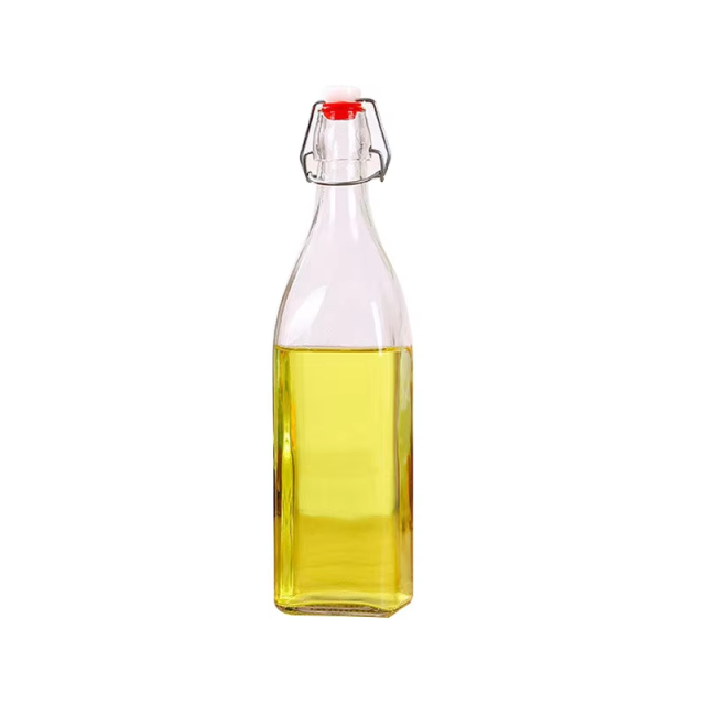 Hot sale custom clear beer bottle with opener and swing top