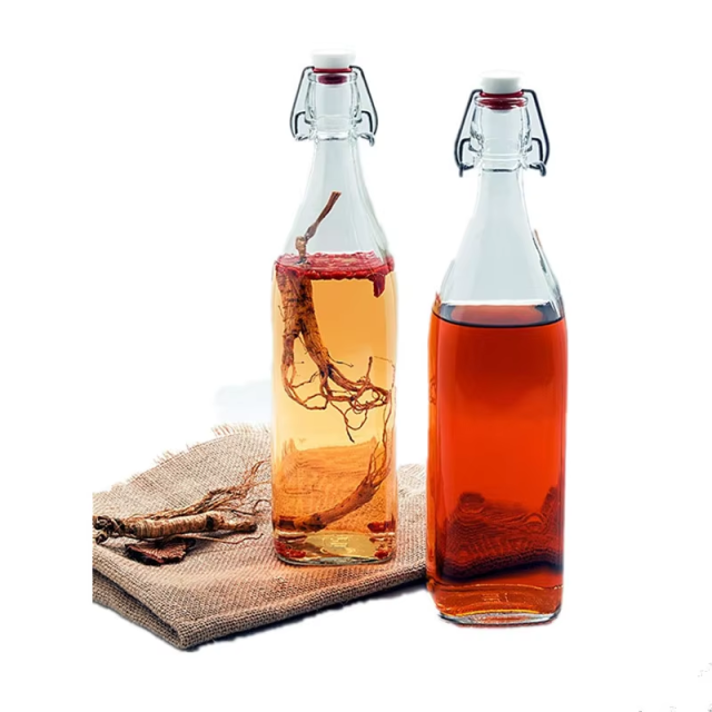 Hot sale custom clear beer bottle with opener and swing top