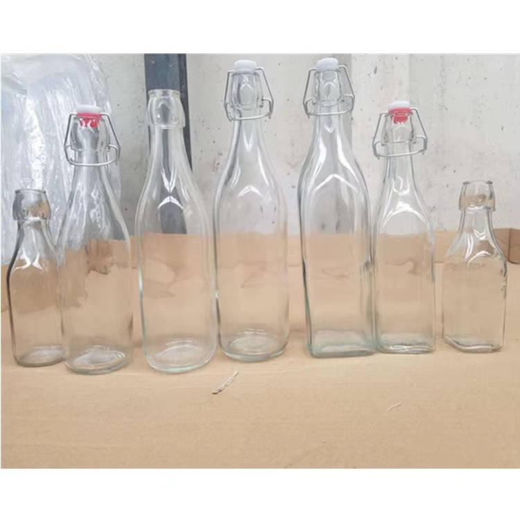 Hot sale custom clear beer bottle with opener and swing top