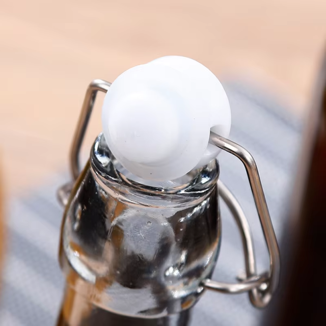 Wholesale 330ml 750ml beverage beer glass swing bottle with lid