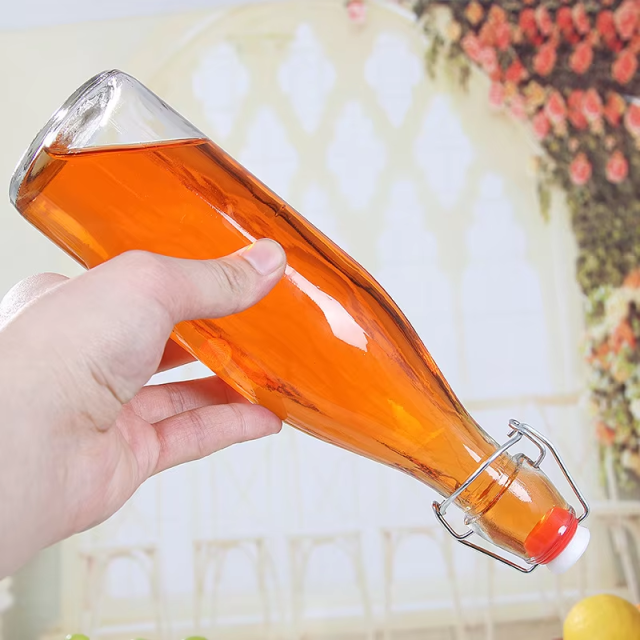 Wholesale 500ml 750ml flip swing top glass water bottle for juice