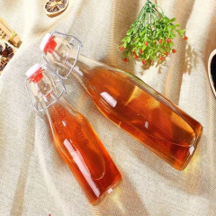 Wholesale 500ml 750ml flip swing top glass water bottle for juice