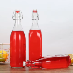 Custom 330ml 500ml 750ml glass drink water bottles with swing top