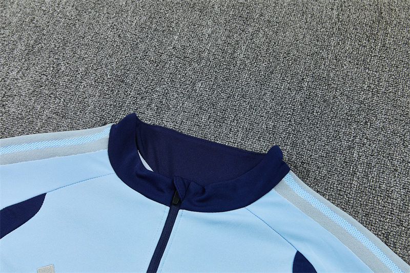 26/27 Ajax Light Blue Tracksuits