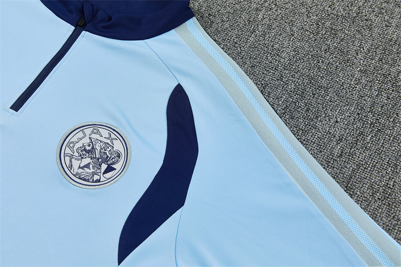 26/27 Ajax Light Blue Tracksuits